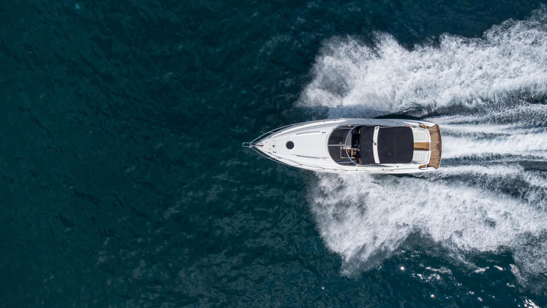 Aerial view of speed boat on sea